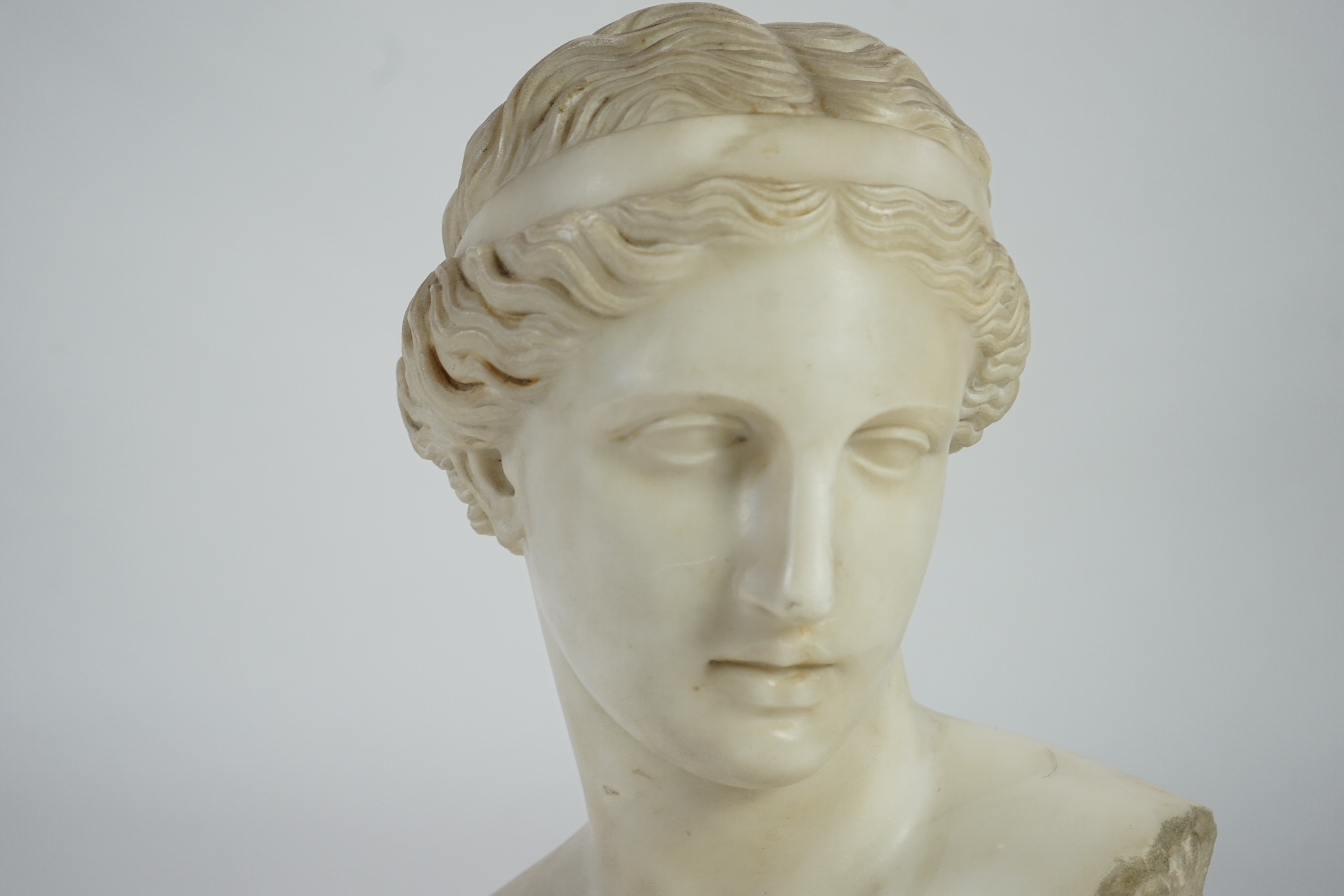 After the antique. A 19th century white marble bust of Venus